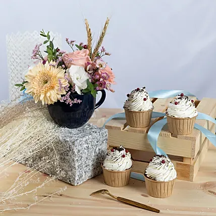Flowers arrangement and Vanilla Cupcakes